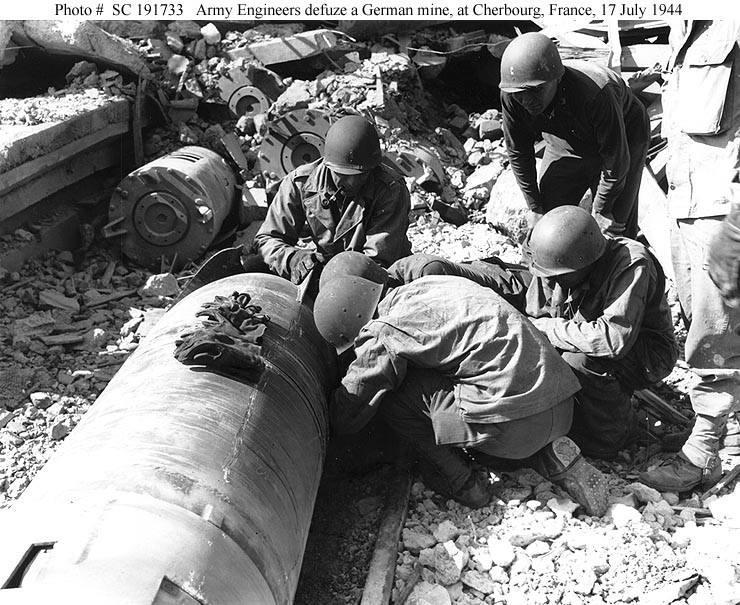 U.S. Army Engineers remove the fuze mine